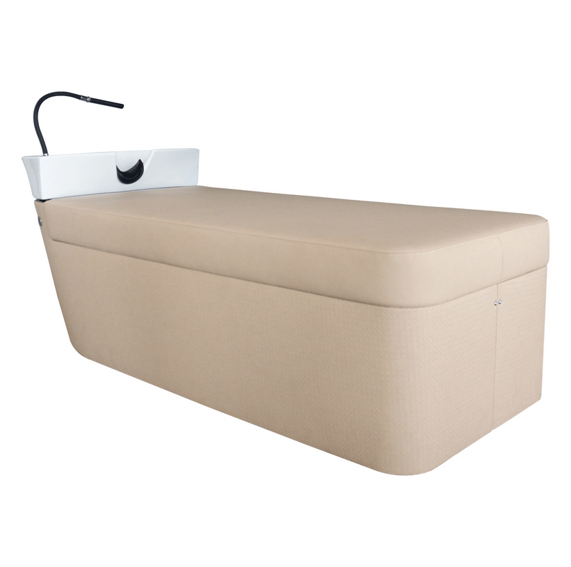 Gravity is een Hair Spa die ontworpen is om een maximaal comfort en functionaliteit te bieden in een professionele omgeving. De structuur is elektronisch verstelbaar, waarmee het bed eenvoudig kan worden verhoogd en verlaagd om te voldoen aan de specifieke behoeften van zowel de klant als de professional. Dit elektrische verstellingssysteem zorgt voor gepersonaliseerd comfort en gebruiksgemak tijdens behandelingen. Het bed is bekleed met een innovatief materiaal dat duurzaamheid combineert met een verfijnde esthetiek. Deze bekleding zorgt niet alleen voor langdurige veerkracht, maar voegt ook een vleugje elegantie toe, waardoor het naadloos past in elke salonomgeving. Een ander comfortverhogend kenmerk is het rubber nekkussen, ontworpen om ergonomische ondersteuning te bieden tijdens het gebruik, waardoor de ervaring van de klant aangenamer wordt. De combinatie van hoogwaardige materialen en ergonomisch ontwerp maakt Gravity de ideale keuze voor professionals die functionaliteit, stijl en comfort in één product zoeken.
